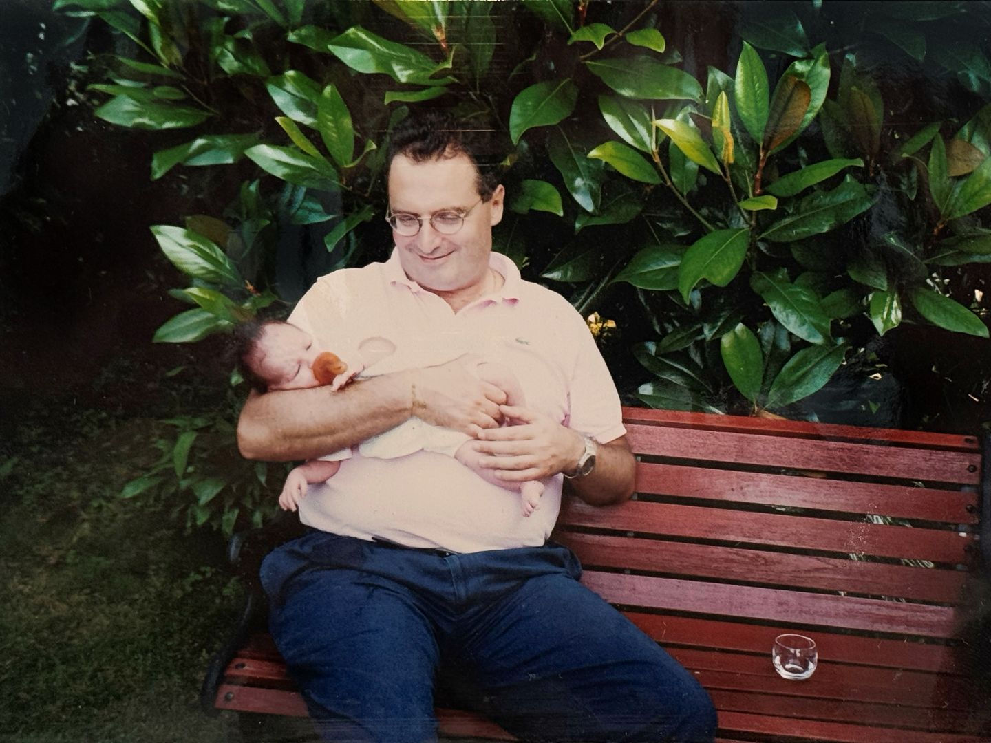 Franco holding Federico Ziviani in his arms in 1995